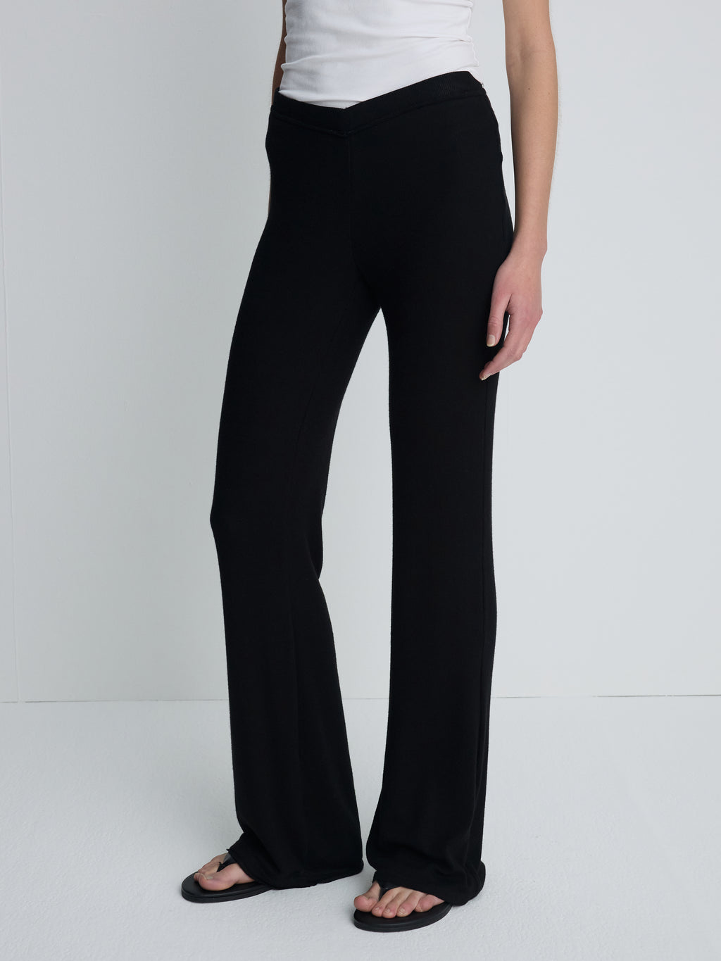 (W) TENCEL RIBBED FLARED PANTS_ BLACK
