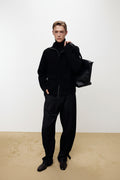 WOOL TWILL CURVED-LEG STRAP TROUSERS_ BLACK