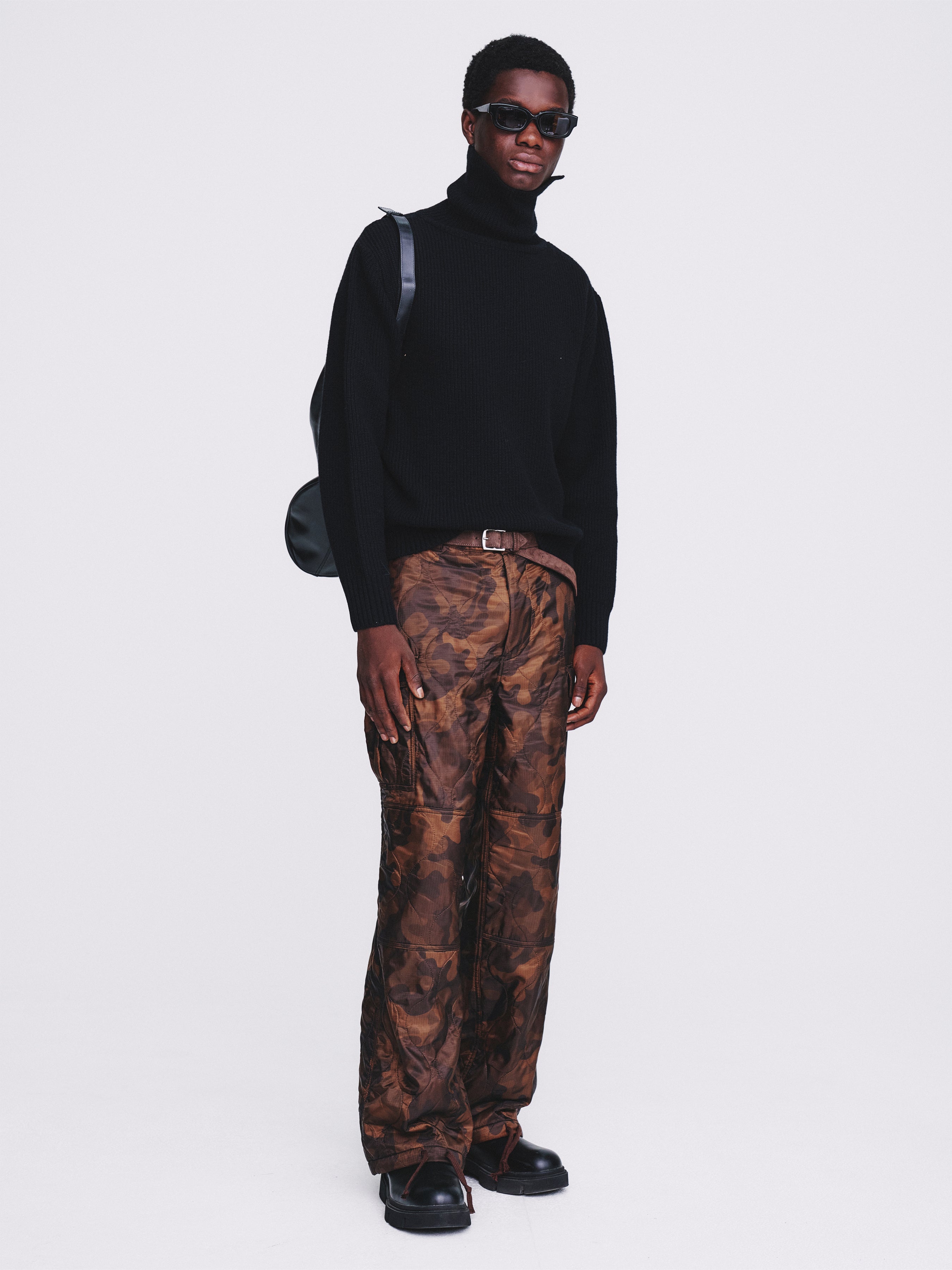 Hard Twist Wool Slit Turtleneck Knit_ Black