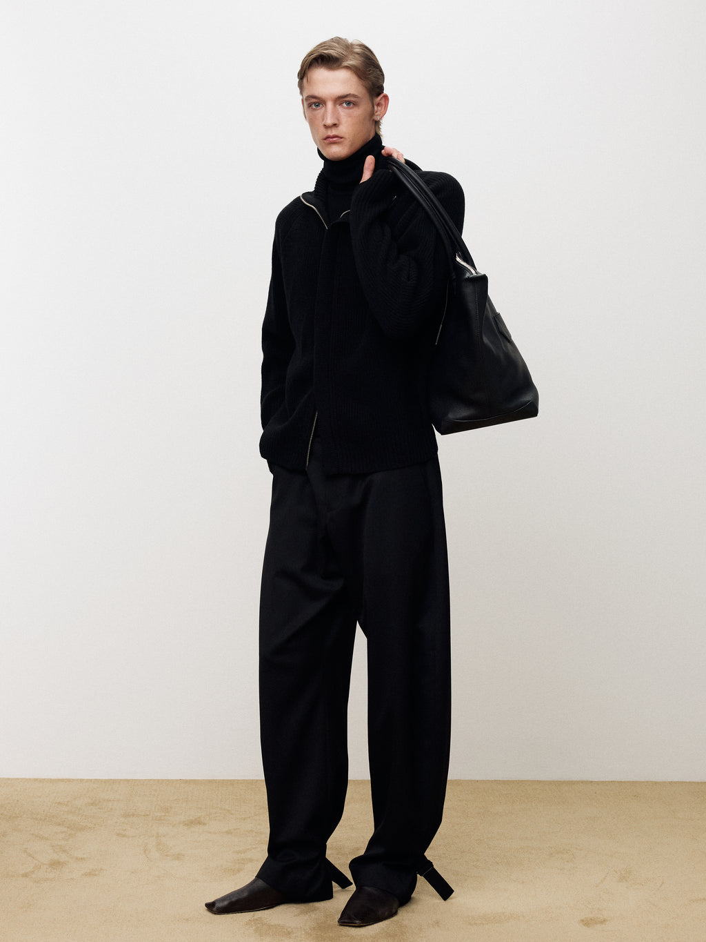WOOL TWILL CURVED-LEG STRAP TROUSERS_ BLACK