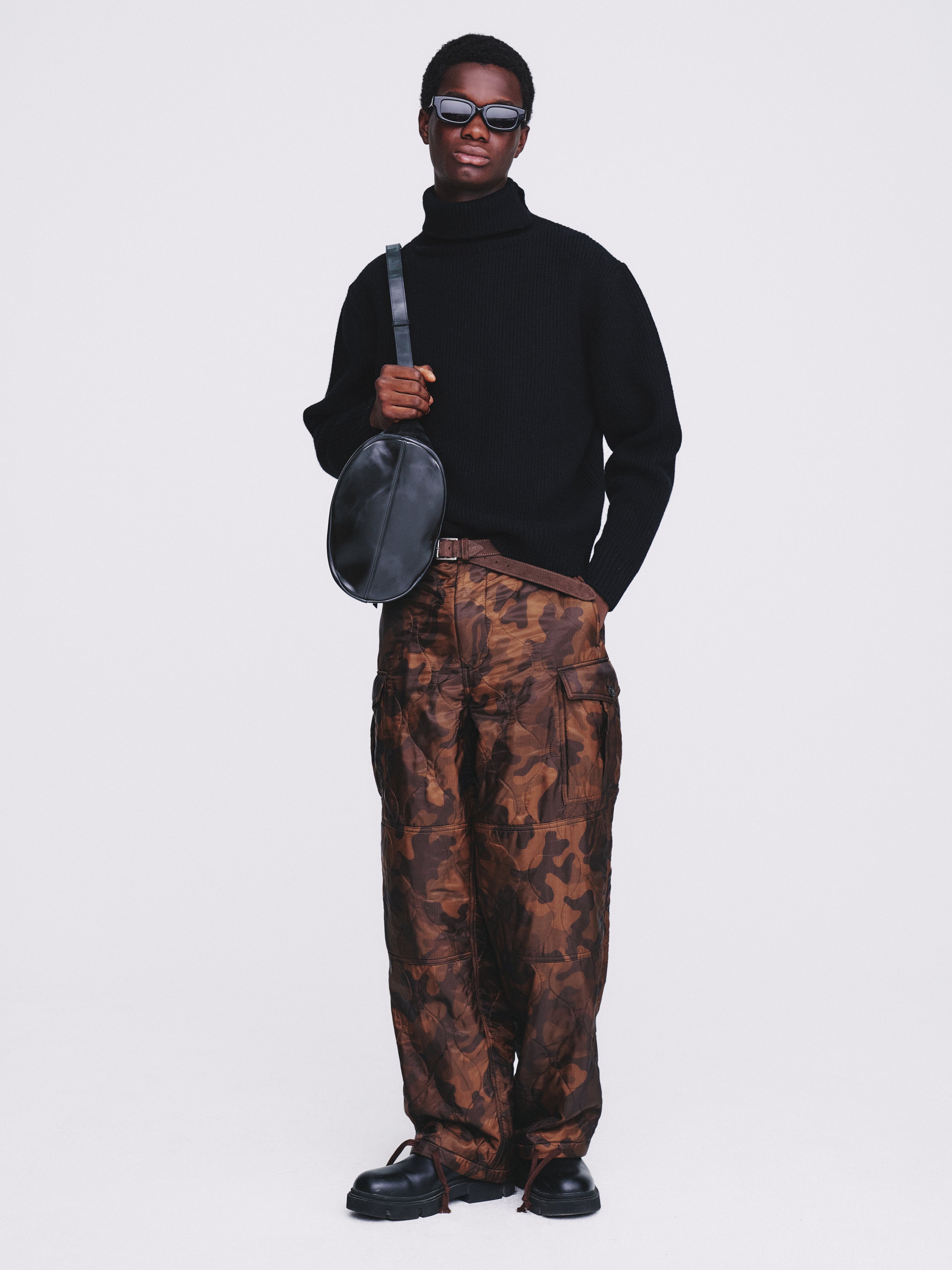Hard Twist Wool Slit Turtleneck Knit_ Black